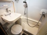 The small but perfectly formed washroom in a short-wheelbase ’van is another WildAx wonder; a tambour door affords easy access