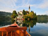 Visit Slovenia on tour and be charmed by Lake Bled, which has a castle and a small island