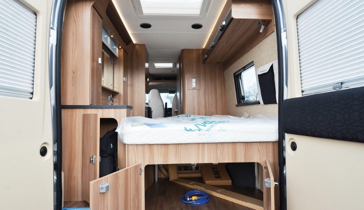 The Autocruise Alto’s rear doors open to allow easy access to the storage area below the bed