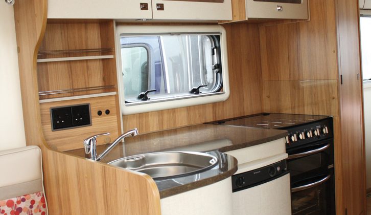 The kitchen in the Approach Autograph 730 has all the kit you need in a motorhome, including a dual-fuel hob, separate oven and grill, fridge, stainless steel sink and good worktop space