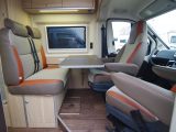 The table is a good size, yet folds away completely to fit flush with the wall. There’s a neat storage cubby hidden beneath the floor in the HymerCar Sierra Nevada motorhome, too