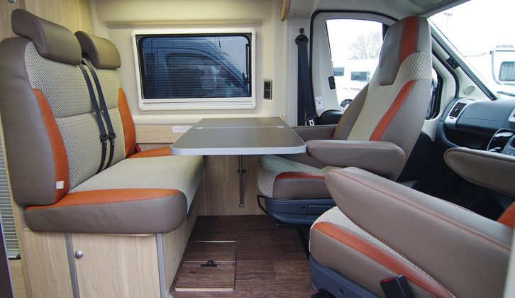 The table is a good size, yet folds away completely to fit flush with the wall. There’s a neat storage cubby hidden beneath the floor in the HymerCar Sierra Nevada motorhome, too