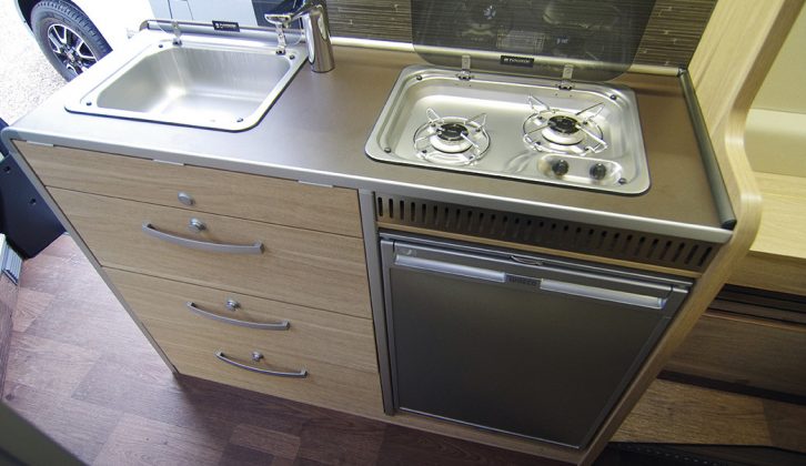 The kitchen is relatively small, but it doesn’t feel cramped. There’s a useful fridge and a good-sized sink, but no oven or grill in the HymerCar Sierra Nevada motorhome for 2015