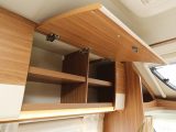 Spacious overhead lockers in the front lounge will accept plenty of items on those nicely divided shelves. The mood lighting at the bottom is a pleasing touch to find in a modestly priced motorhome