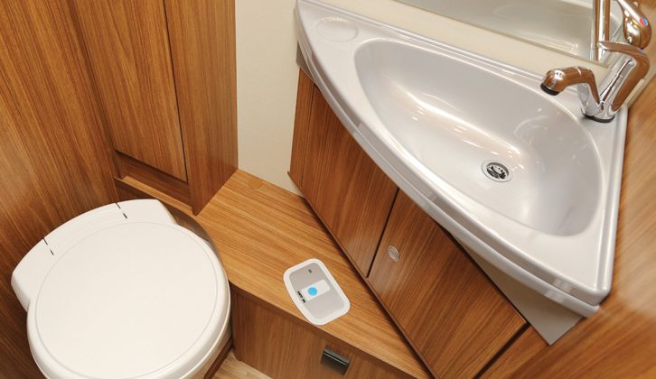 The toilet and vanity room is located on the UK offside. There’s a wide half-length mirror and tall cupboard to the left-hand of the sink in the Carado T 339