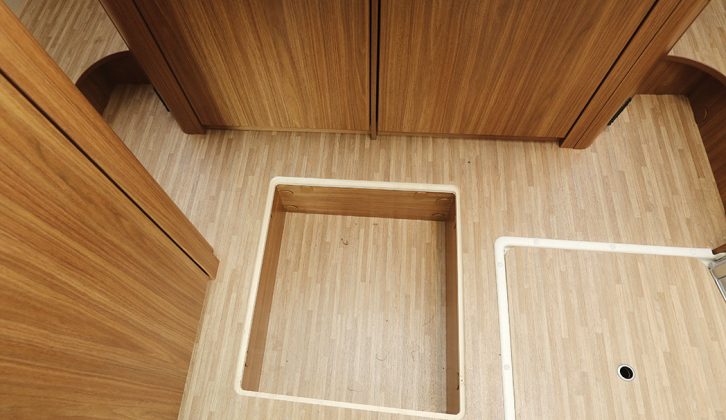 Storage for valuables is also included, here at the foot of the rear bed. The under-bed cupboard also houses the Truma Combi heater unit to keep you warm in the Carado T 339 motorhome