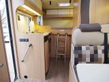 A grab-handle helps you to climb into the T60, and once inside there’s a light and pleasant ambience from the pale wood and trim – as you'd expect from a motorhome called Sunlight!