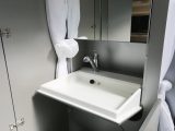 The flip-up washbasin is a key part of the ingenious and versatile washroom in the Adria Twin 500 S