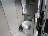 When not in use, the flip-up sink vanishes into the wall in the compact Adria Twin 500 S van conversion