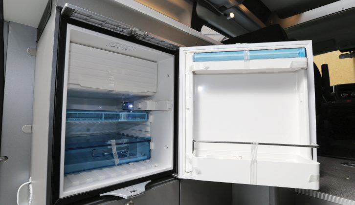 There's a tiny compressor fridge with a freezer compartment in the Adria Twin 500 S