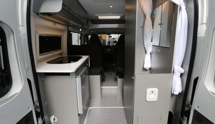 The rear doors of this van conversion open wide so if you're dining al-fresco it's easy to hand food out from the kitchen to the diners sitting expectantly outside in the sunshine