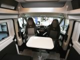 The dining table is stashed in a dedicated cavity below the lounge floor, so you'll need to open the side door of the Adria Twin 500 S to get it out