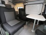 The rear travel seats make comfortable lounge/dining seats in the centre of the Adria Twin 500 S and have reading lights and headrests. Swivel the cab seats for extra seating in the lounge