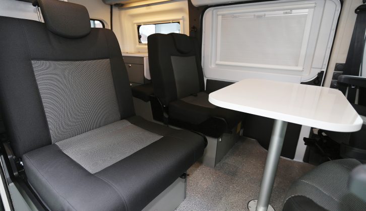 The rear travel seats make comfortable lounge/dining seats in the centre of the Adria Twin 500 S and have reading lights and headrests. Swivel the cab seats for extra seating in the lounge