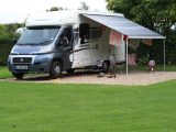 Adapting to motorcaravanning took no time, the Charmouth site's pitches well-kept and giving plenty of privacy