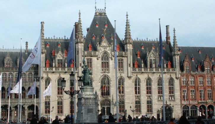 Bruges is a popular tourist destination; take a boat tour along the canals to see the magnificent architecture from a distance