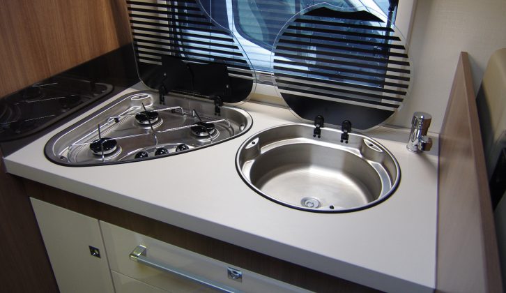 Worktop space is limited, but the hob has spark ignition and the sink is bigger than average – and both have glass covers