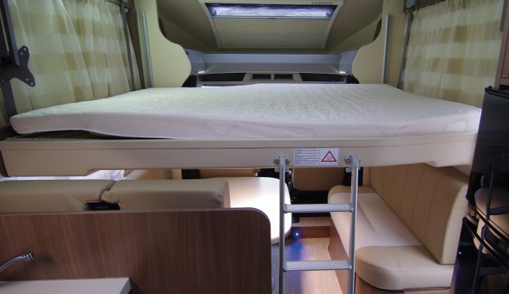 The electric roof bed lowers quickly via the turn of a key and lowers further than shown here if there’s just two of you on board