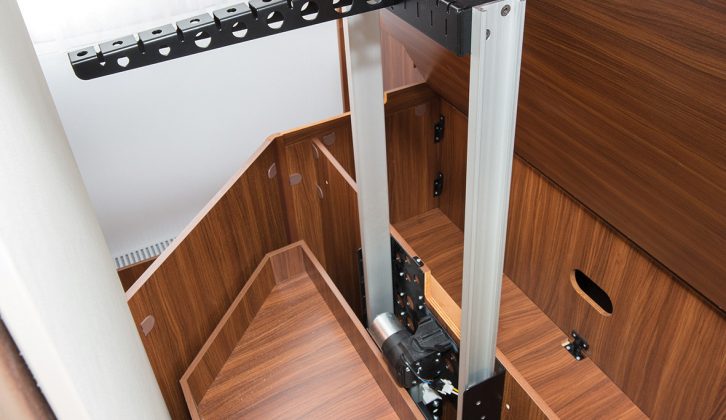 Lift the bed to access a retractable hanging rail – how very innovative from Adria