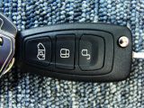 The remote key fob offers the useful facility of just unlocking the side sliding door while leaving the others securely locked