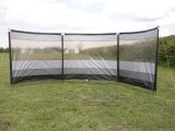 This windbreak features horizontal top bars, but unlike similar modern windbreaks these bars are made to a set curve