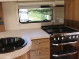 There's a circular sink, microwave oven and a dual-fuel cooker with separate oven and grill in this motorhome