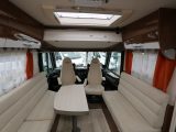 The 2016 Pilote Galaxy G650L has a large lounge, the orange curtains from the Essentiel trim line adding a dash of colour