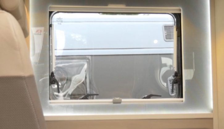 This snazzy, backlit side window is one of many touches that brings light into this 2016 motorhome
