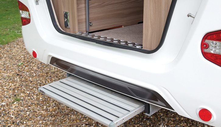 This step deploys at the touch of a button to help access the interior and reach the tailgate to lower it
