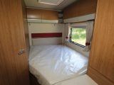 The cutaway reduces space so the shorter of the two occupants will have to sleep here in the 1.9m x 1.35m (6ft 3in x 4ft 5in) rear French bed