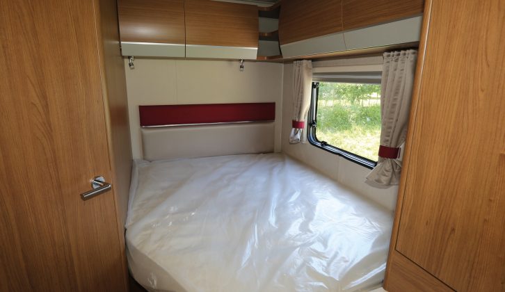 The cutaway reduces space so the shorter of the two occupants will have to sleep here in the 1.9m x 1.35m (6ft 3in x 4ft 5in) rear French bed