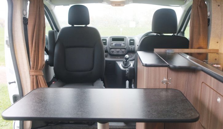The dining table can serve three and stands firmly on a single pedestal – read more in the Practical Motorhome Hillside Leisure Ellastone review