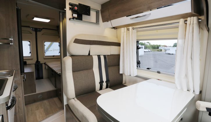 Inside the V630, which has twin single beds, a central washroom and a half-dinette