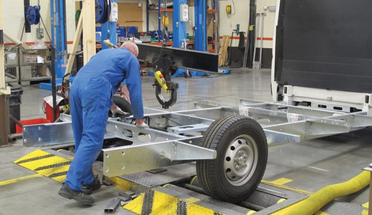 A completed chassis is subjected to numerous tests before it is deemed ready for the later conversion work – adding weights before testing brakes on this rolling road is only one of the many checks