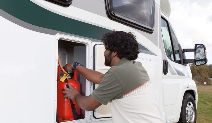Propane, in red containers, is the most reliable camping gas to use in cold climates