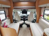Inside the 2016 Auto-Trail Imala 730 which has a large footprint allowing generous parallel sofas in the lounge