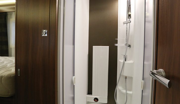 Showering in winter will be enhanced by the central-heating radiator in the cubicle