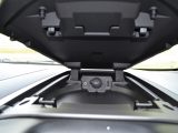 The top of the dashboard opens to reveal 12V and USB ports and somewhere to put a phone and sat-nav