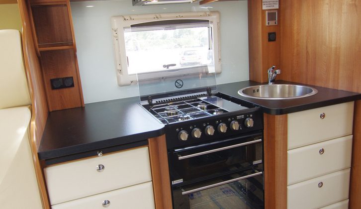 Chefs will love this roomy kitchen with its full-size oven and masses of storage space
