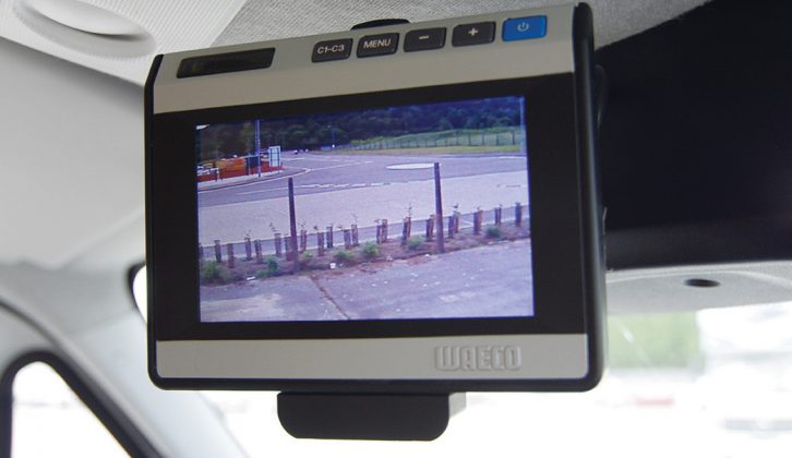 Instead of a rear-view mirror, there's a rear-facing camera and screen in the cab