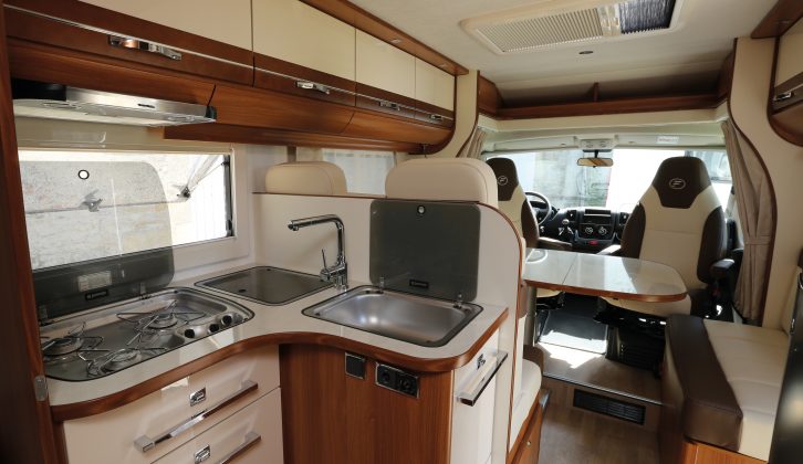 The 2016 Fleurette Migrateur 67 LG features a mid-toned wood and cream interior