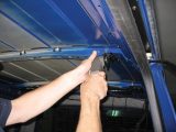 To fit an elevating roof or a high-top moulding, van converters cut cross members, then strengthen the 'van with an alternative steel frame