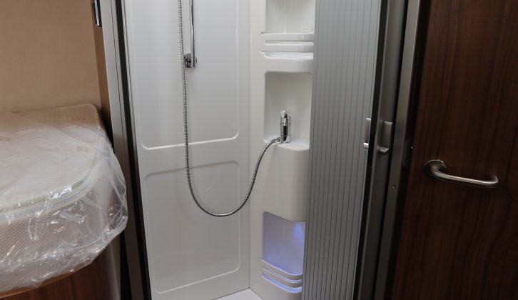 The shower cubicle is on the nearside – the wooden duckboards are a £145 cost option