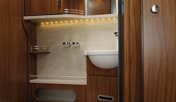 Opposite the shower is the smartly-finished toilet compartment – the door can be used to partition the 'van