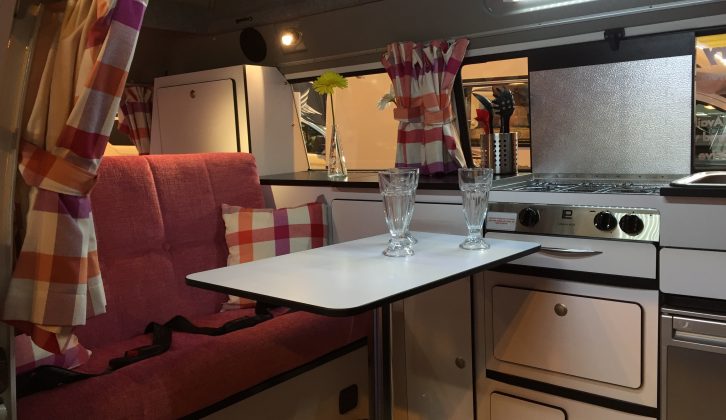 A classic body but a modern interior for this pink VW campervan – see it at the NEC