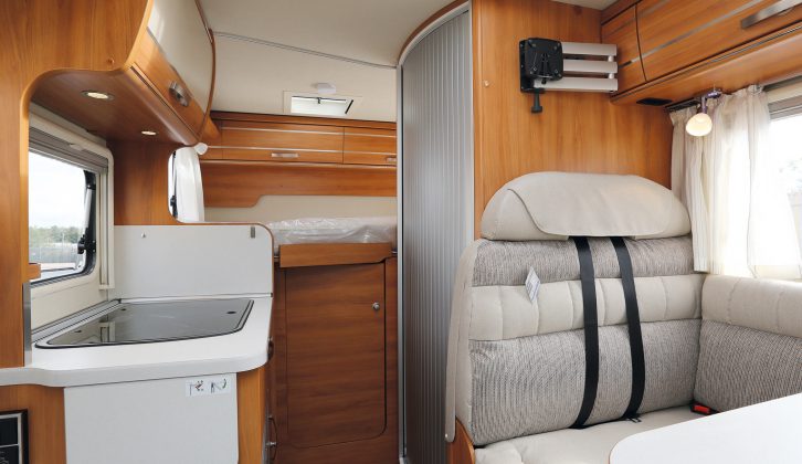 The wardrobe is under the transverse rear bed and the Comfort pack adds belts to the bench seat