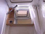 There's a washroom with a shower, plus a kitchen, a dinette and a transverse bed in the Hymer Van 314