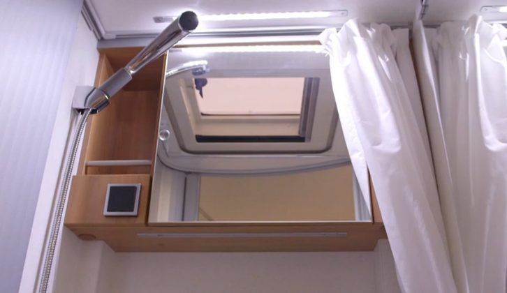 There's a washroom with a shower, plus a kitchen, a dinette and a transverse bed in the Hymer Van 314