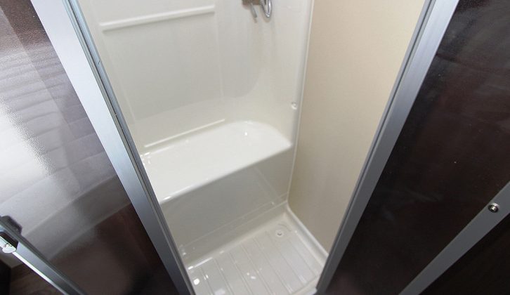 Intrusion of the wheel arch in the shower prompted Roller Team to include this handy seat or shelf