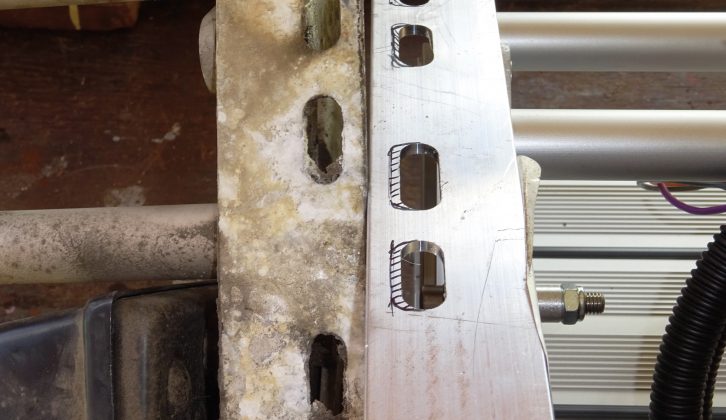 Mounting holes were in different places on the old step (left)  and new step (right)